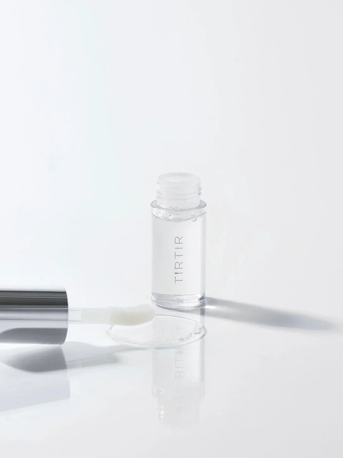 "Tirtir lip oil, nourishing lip oil, hydrating lip oil, glossy lips, lip care, moisturizing lip oil"