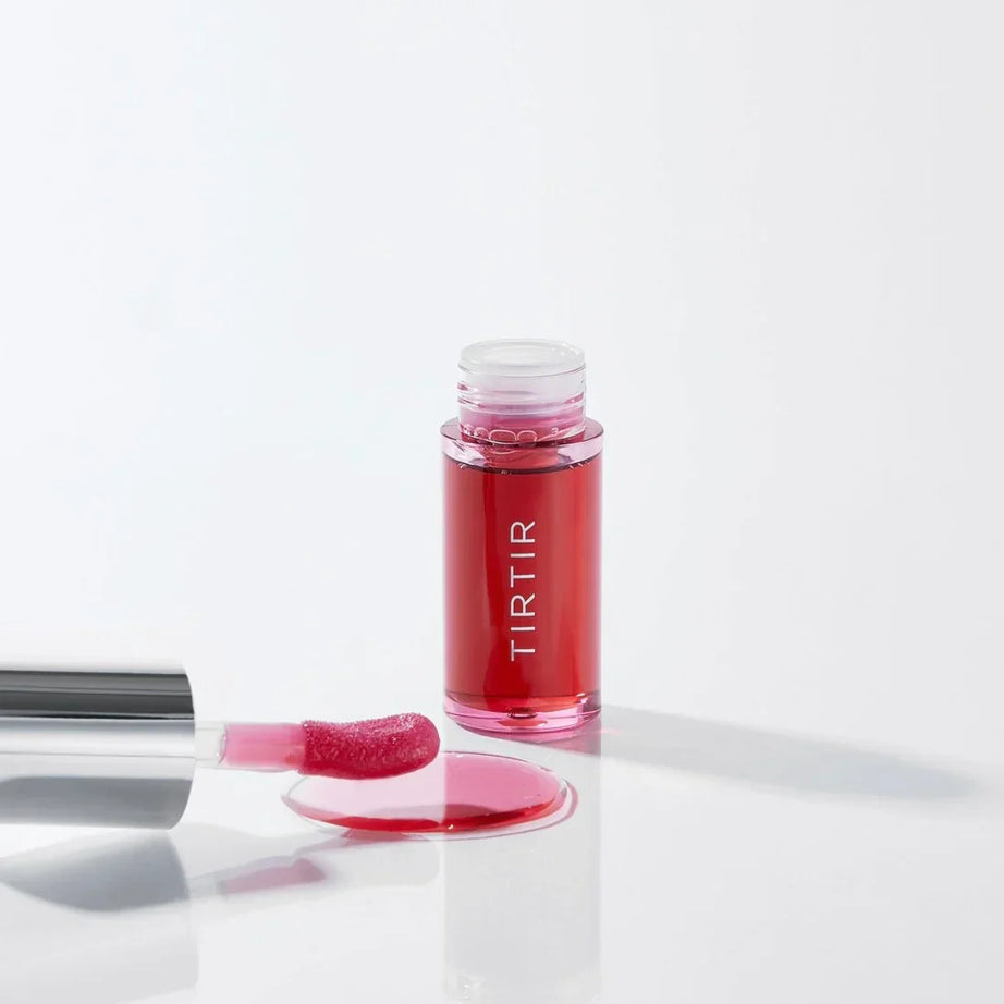 "Tirtir lip oil, glossy lip oil, hydrating lip oil, moisturizing lip care, shiny lips, nourishing lip gloss"